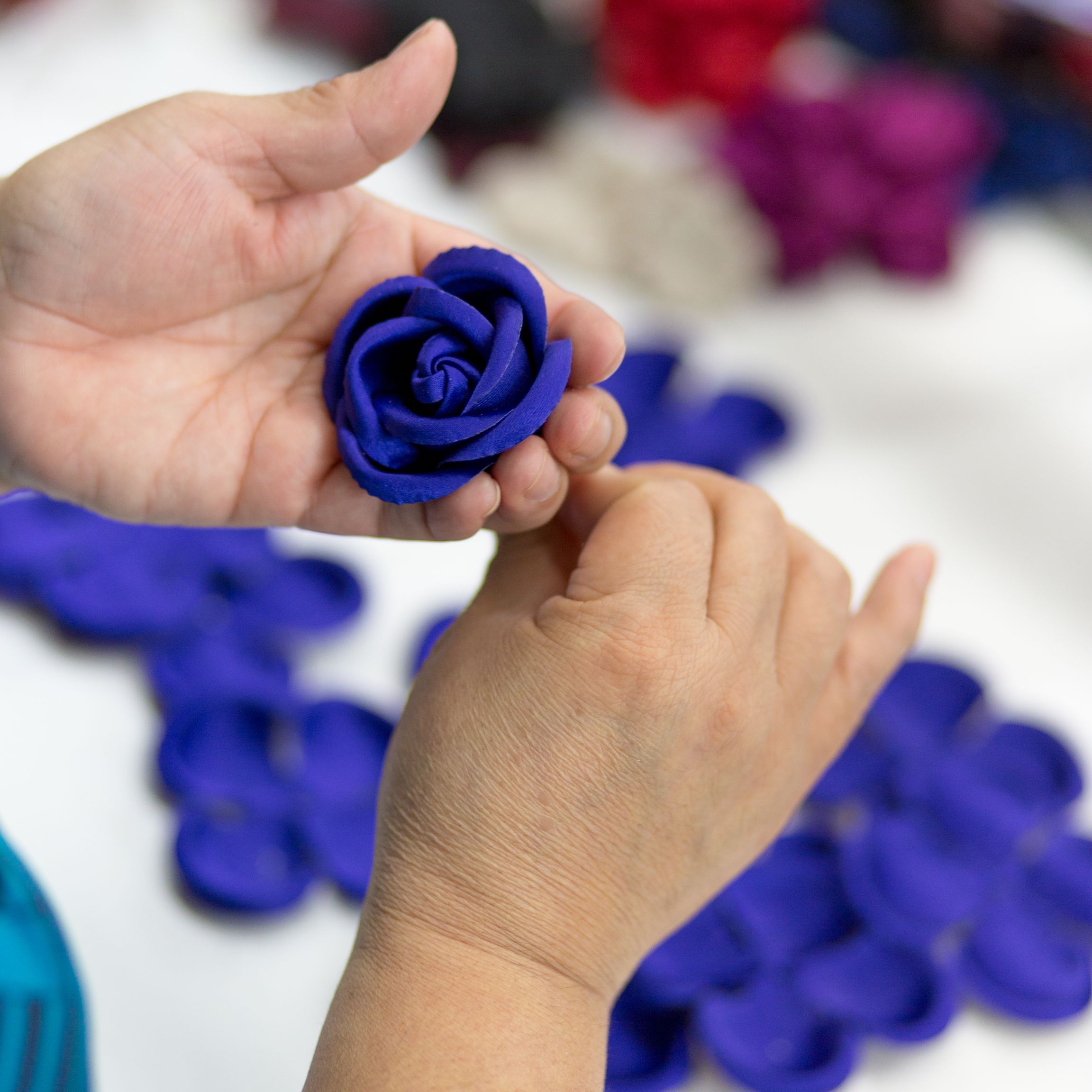 Flowers can be made using all kinds of fabric, including satin, silk, and even velvet. Image courtesy of M&S Schmalberg.